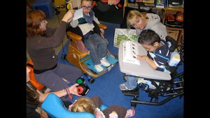 A group of three teachers engaged with three students